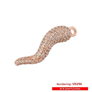 Detailed macro view of S-shaped chili pendant with dimensions 31mm length and 8.5mm width