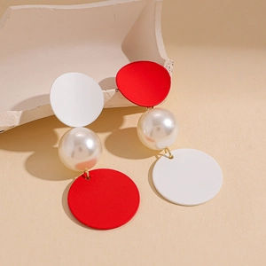 Asymmetric faux pearl drop earrings with red and white painted circular discs