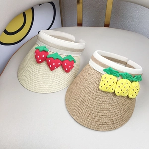 Straw sun visors for kids featuring 3D strawberry and pineapple fruit decorations