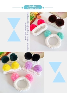 Detail of soft coral fleece headband featuring colorful plush balls for facial washing