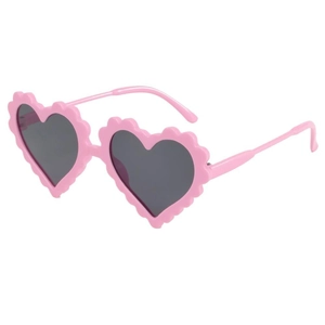 Pink heart-shaped sunglasses for kids with wavy petal edges and dark gray lenses