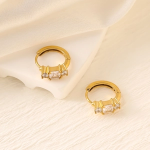 Detail of 18K gold-plated stainless steel hoop earrings with three zircon stones