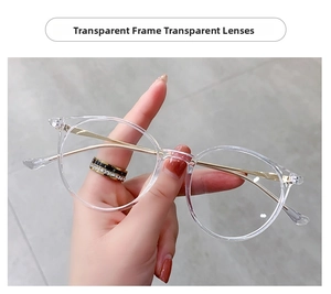 Detailed close-up of transparent resin frames with gold metal temples and sharp hinge detail