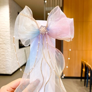 Rainbow mesh bow hairclip with pearl rhinestone flower and gold tassel chains