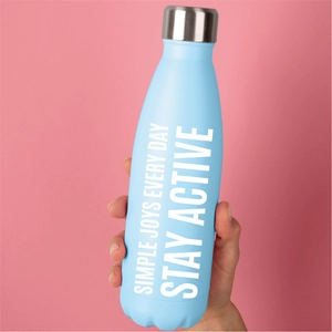Detail of blue vinyl letter stickers applied to a water bottle with creative DIY design