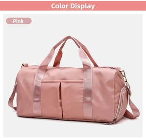 Pink large capacity fitness bag with detachable shoulder strap and exterior pockets