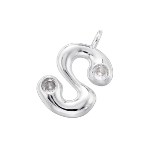 Detail of silver letter S pendant with sparkling zircon stones and polished finish