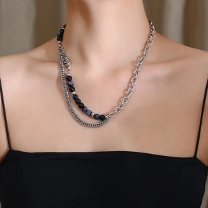 Double-layered titanium steel necklace with natural blue stone beads on model