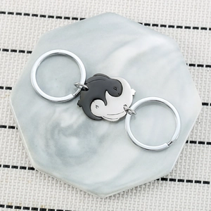 Cute black and white rabbit jigsaw keychain made of stainless steel for couples