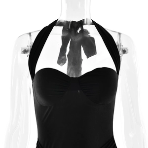 Detailed view of the sleek black halter neck bodice with elegant tailored fit