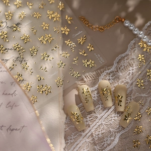 Exquisite gold 3D embossed floral nail stickers set with vintage petals and leaves