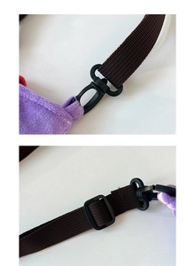 Detail of adjustable nylon strap and lobster clasp on purple plush shoulder bag