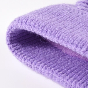 Winter chunky knit beanie in purple with soft warm texture for women's outdoor wear