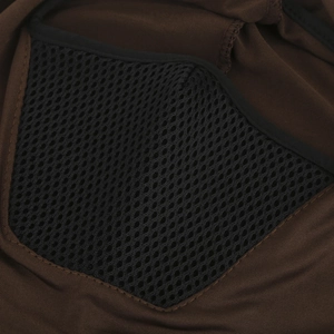 Close-up view of the breathable black mesh ventilation area on a brown cycling mask