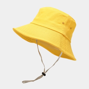 Detail of yellow sun hat featuring reinforced stitching on brim and windproof rope