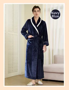 Detail of navy blue flannel bathrobe for men with white trim and soft fleece texture