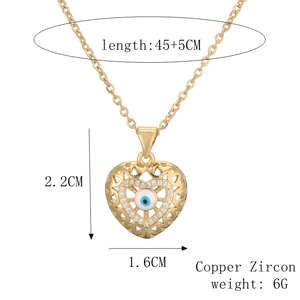 Detail view of gold-plated heart pendant with evil eye motif and technical dimensions