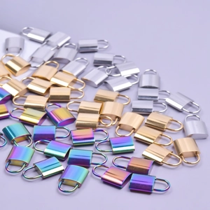 Assorted gold, silver, and rainbow titanium steel padlock pendants for DIY jewelry making