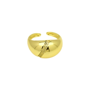 Detail shot of a gold adjustable ring featuring a diagonal band of sparkling zircons