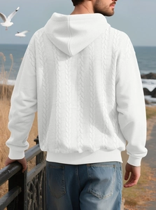 Detailed back view of white thick cable knit hoodie featuring a ribbed hem and cuffs