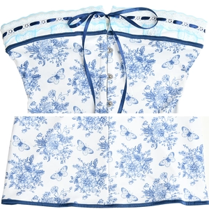 Close-up of floral butterfly print corset top with lace trim and blue ribbon tie