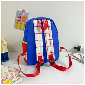 Detail showing colorful straps with red and white grid pattern on blue kids backpack