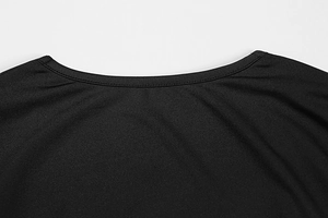 Close-up of the elegant round neckline on a black knitted long-sleeve dress
