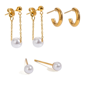 Golden stainless steel earring set featuring pearl pendants and C-shape studs on white background