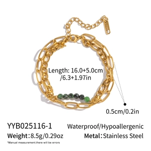 Detail of a 18K gold plated stainless steel double layer bracelet with lapis lazuli beads