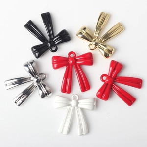 Colorful alloy bow pendants for DIY jewelry making in multiple vibrant paint finishes