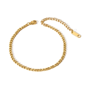 Detailed close-up of 18K gold-plated stainless steel Cuban link bracelet with lobster clasp