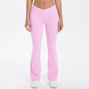 Front view of pink flared yoga pants showing high-waisted V-shaped crossover design with white trim