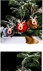 Three felt reindeer Christmas tree ornaments with soft wool balls and wooden deer heads