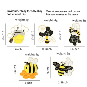 Cute honey bee enamel pin collection showing exact dimensions for each metal badge