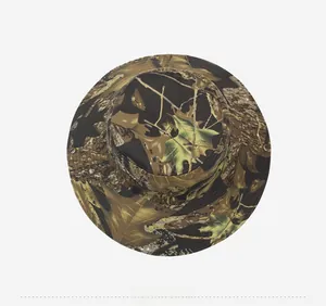 Top down view of camouflage tactical boonie hat with wide brim and metal ventilation eyelets