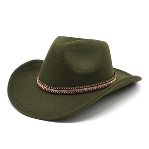 Detail of dark olive green felt cowboy hat with rhinestone and gold studded leather band