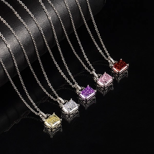 Macro shot of colorful square cut high-carbon diamond pendants in silver necklaces
