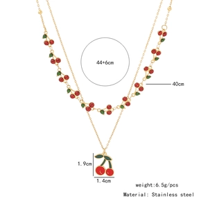 Détails du collier double couche en acier doré avec pendentifs cerises rouges