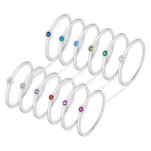 Set of 12 silver-tone birthstone rings with colorful cubic zirconia stones in array layout