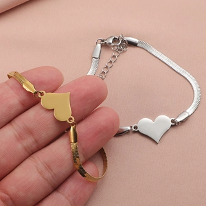 Minimalist heart charm snake chain bracelet in gold and silver stainless steel