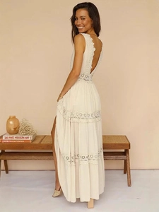 Elegant sleeveless backless lace maxi dress in cream white with bohemian crochet details