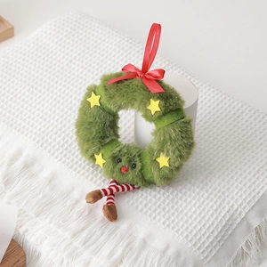 Ghirlanda natalizia in peluche verde con fiocco rosso e gambe a righe decorative