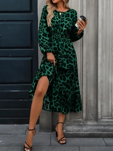 Elegant emerald green leopard print midi dress with lantern sleeves and ruffled hem design