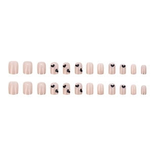 Short round nude pink press-on nails with black heart patterns and glitter finish