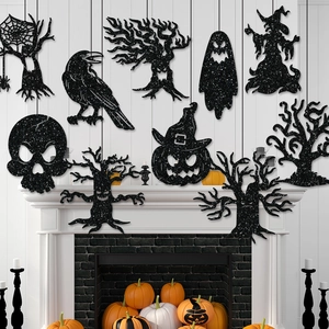 Black glitter Halloween hanging ornaments featuring ghost and pumpkin motifs for fireplace decor