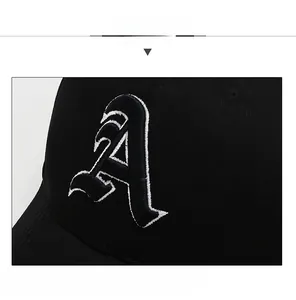 Detailed close-up of premium 3D white letter A embroidery on a black cotton baseball cap