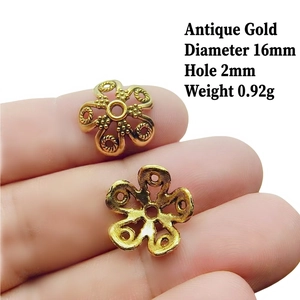 Detail view of antique gold 16mm hollow flower bead cap for DIY jewelry accessories