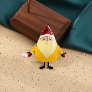 Detail of Santa dwarf brooch with enamel finish and white faux pearl accent on silk