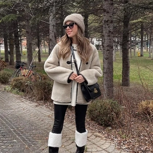 Veste femme en peau de mouton retournée abricot avec boutonnage simple pour l'hiver