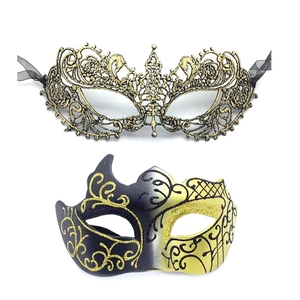 Detail of elegant black lace and gold glitter masquerade masks for Halloween parties